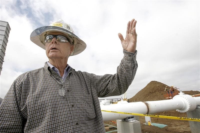 Eric Franzen, Chief Inspector from Mustang Engineering, explains the workings of the Bainbridge Compressor Station on Wednesday in Putnam County. The station is part of the 638-mile Rockies Express-East Pipeline that will carry natural gas from Missouri to Ohio.