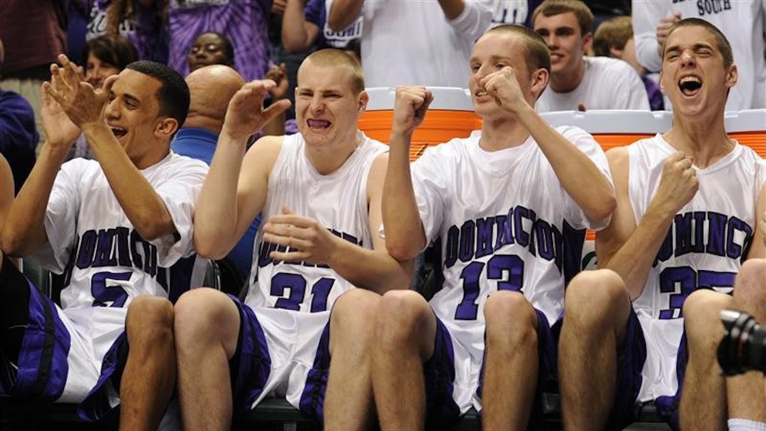 Bloomington South players, from left, Rickey Washington, Marcus Etnier, Brandon French and Curtis Payton react to a late basket in their 69-62 win over Fort Wayne Snider in the IHSAA Class 4A boys basketball state finals action at Conseco Fieldhouse on Saturday in Indianapolis.