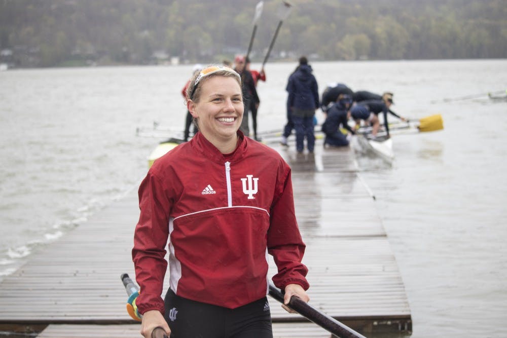 <p>Senior varsity rower Emma Lawrie smiles after winning a race April 20 at Dale England Rowing Center on Lake Lemon. IU beat University of Notre Dame and Michigan State.</p>