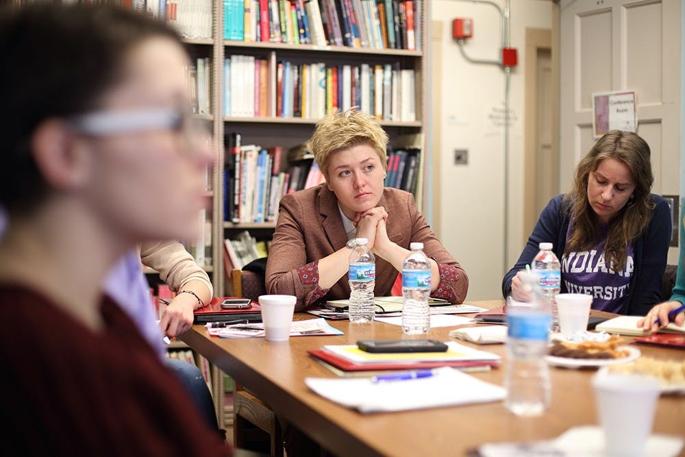 Yulia Papanova of Yugra State University listens during a session on international strategic planning at IU's East Asian Studies Center. To her right is Olga Mukhina of the Baltic Fishing Fleet State Academy.