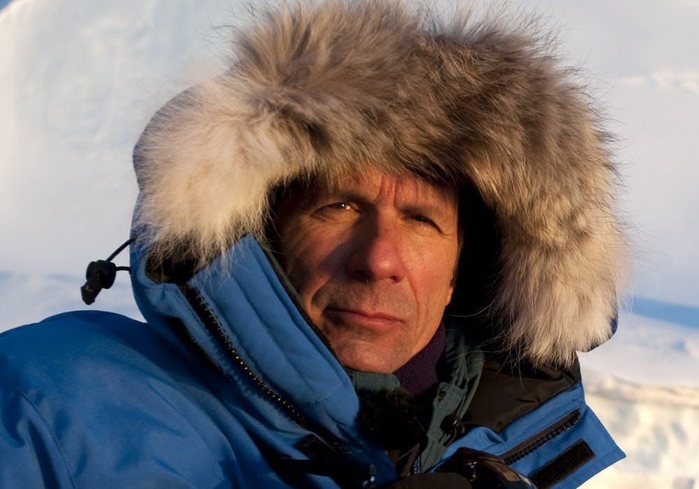 James Balog, a photographer, is shown at minus 30 degrees Fahrenheit in Disko Bay, Greenland. His work is displayed in the Kelley School of Business.