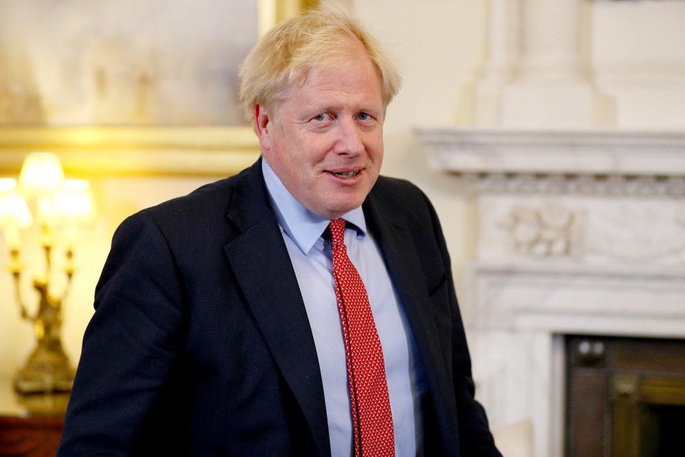 Prime Minister Boris Johnson speaks before a private meeting Oct. 8 in London, England. 