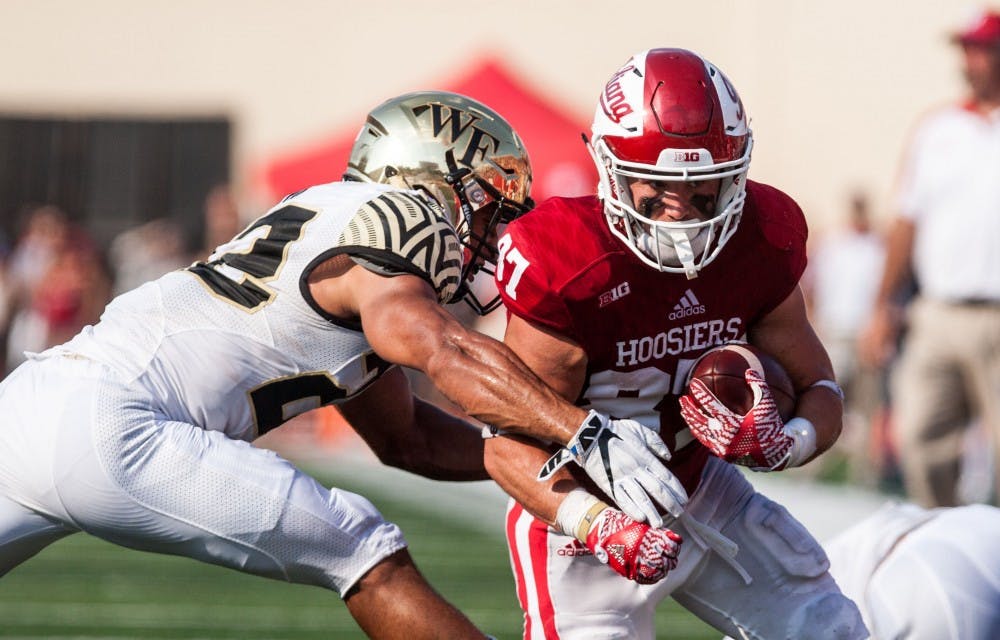 Senior Mitchell Paige dodges a Wake Forest defender while attemping to score. 