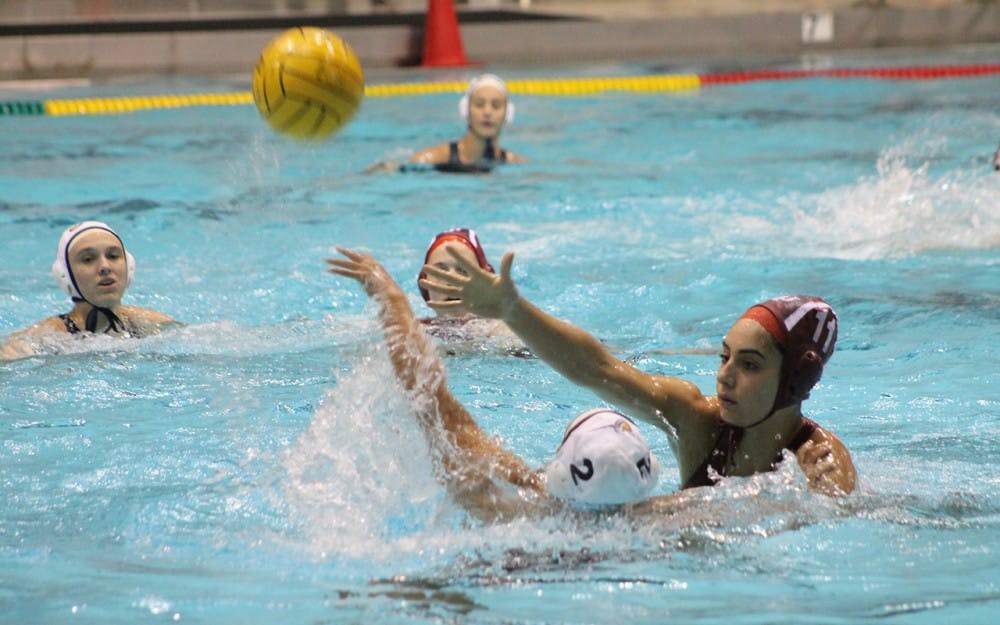 Freshman Joelle Nacouzi attempts to block a pass by Paizlee Dreyer of California Baptist University. Nacouzi scored three goals and had 3 assists in Saturday's match up with the Lancers. 