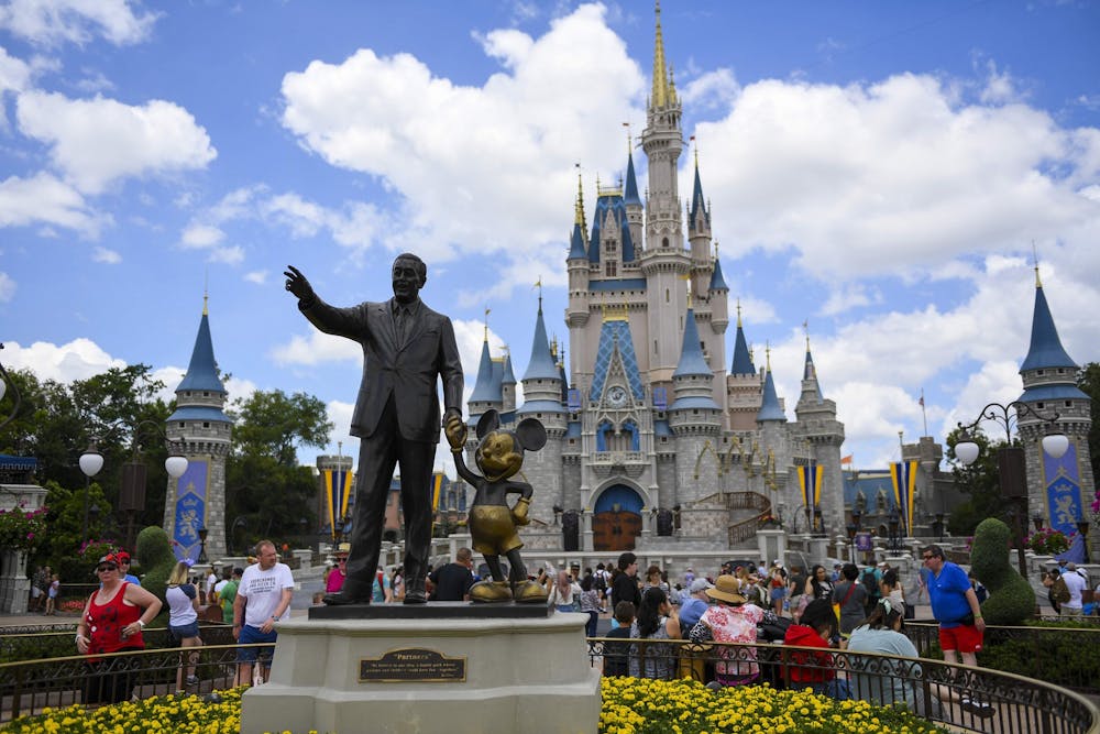 <p>The &quot;Partners&quot; statue sits in front of Cinderella&#x27;s Castle at Magic Kingdom May 1, 2019, at Disney World in Orlando, Florida. </p>