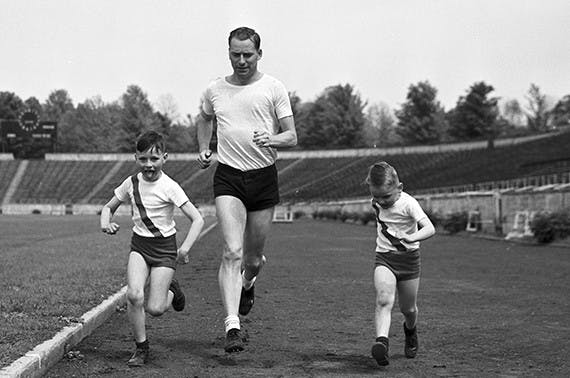 Don Lash runs with his two sons, Russell and David.