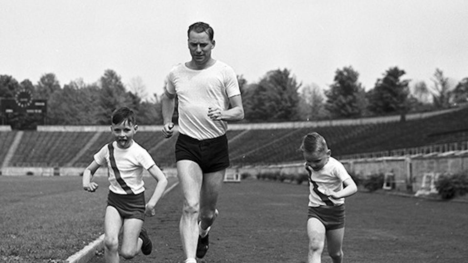 Don Lash runs with his two sons, Russell and David.