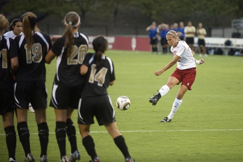 Junior defender Margo McAuley blasts a free kick into the wall during IU's home opener against Western Michigan on Wednesday at Bill Armstrong Stadium. After attending Noblesville High School north of Indianapolis, McAuley went to Florida State University for two and a half years before returning to Indiana.