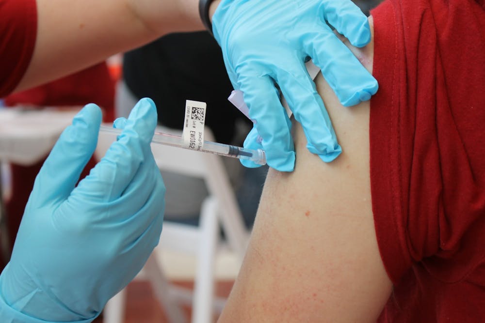 <p>Then-junior Bryce Asher receives a COVID-19 vaccination April 12, 2021, at Simon Skjodt Assembly Hall. The vaccine clinic will be offering the Moderna vaccine and booster on Friday and Saturday at Simon Skjodt Assembly Hall in the south lobby. </p><ul></ul>
