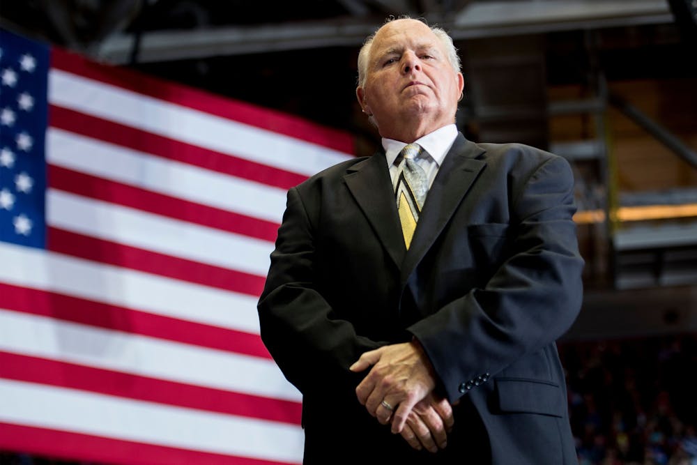 <p>U.S. radio talk show host and conservative political commentator Rush Limbaugh looks on before introducing former President Donald Trump to deliver remarks at a Make America Great Again rally in Cape Girardeau, Missouri, in 2018. Limbaugh died Tuesday after a battle with lung cancer.</p>