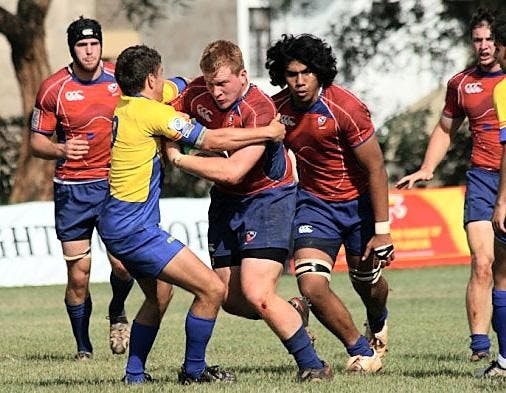 Sophomore Michael Shepherd runs with the ball while Junior Kyle Stroman assists during the IRB Junior World Trophy on June 7th in Kenya. Shepherd and Stroman were scouted to play for the U.S U-20 team during a Big Ten game with IU.