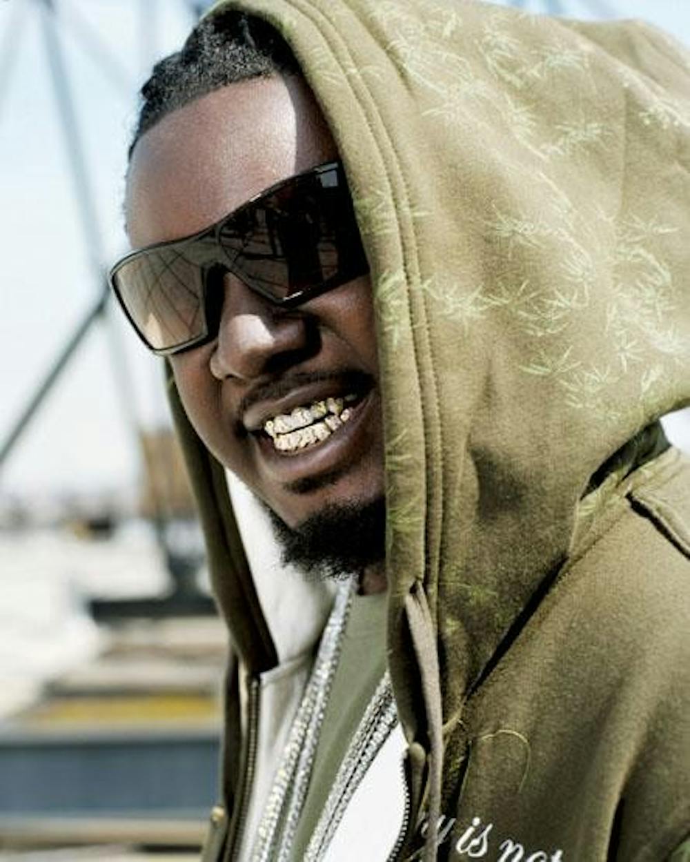 That's sure a golden smile, T-Pain.