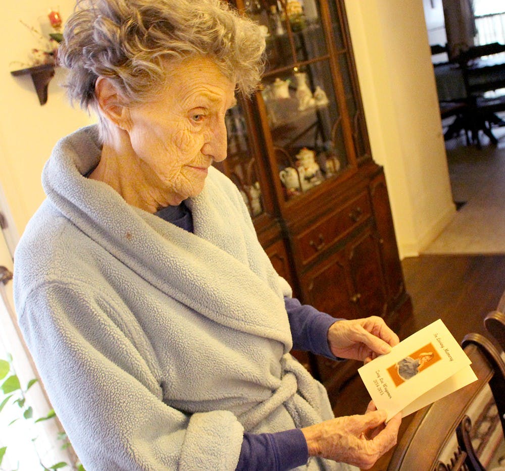 Virginia McPherson, 85, the Wagoner's neighbor, holds the invitation she received last year to the funeral of one-year-old Zoey Wagoner Wednesday at her house. On Wednesday, the day of Matthew S. Wagoner's sentencing, she stayed inside her home in Greenfield with her dog Susie. Last May, on the day before Zoey was killed, she was sitting on her front porch with Susie when she saw Jessica Wagoner walking by in a stroller. Virginia went up and touched Zoey's hand and smiled at the infant. "I'll never forget the look on that child's face," she said. 