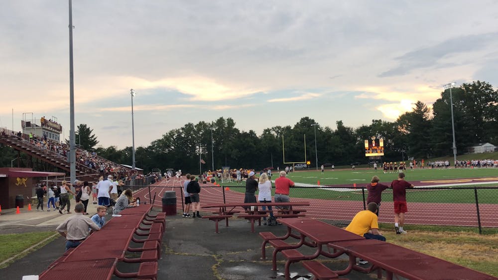 <p>Fans cheer on the Bloomington High School North football team Aug. 27, 2021, in Bloomington. Bloomington High School North, Bloomington High School South and Owen Valley High School won their respective games on Sept. 30.</p>