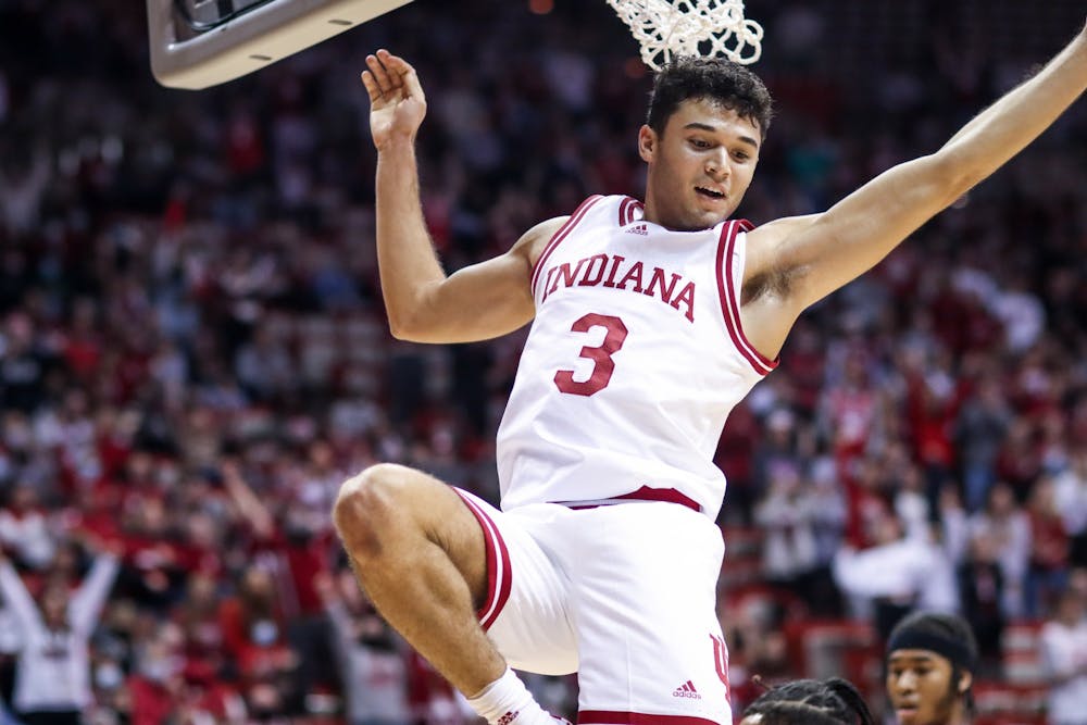 <p>Sophomore guard Anthony Leal smiles after dunking the ball Nov. 12, 2021, at Simon Skjodt Assembly Hall. Indiana will play Minnesota at 6 p.m. Sunday in Minneapolis.</p>