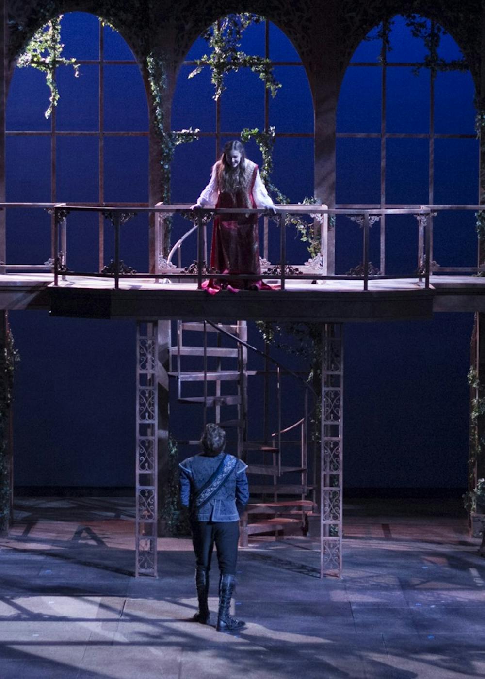 Josh Krause as Romeo and Marisa Eason as Juliet act in the dress rehearsal of "Romeo and Juliet" in the Ruth N. Halls Theatre on Tuesday night. "Romeo and Juliet" is an IU Theatre production and opens Friday.