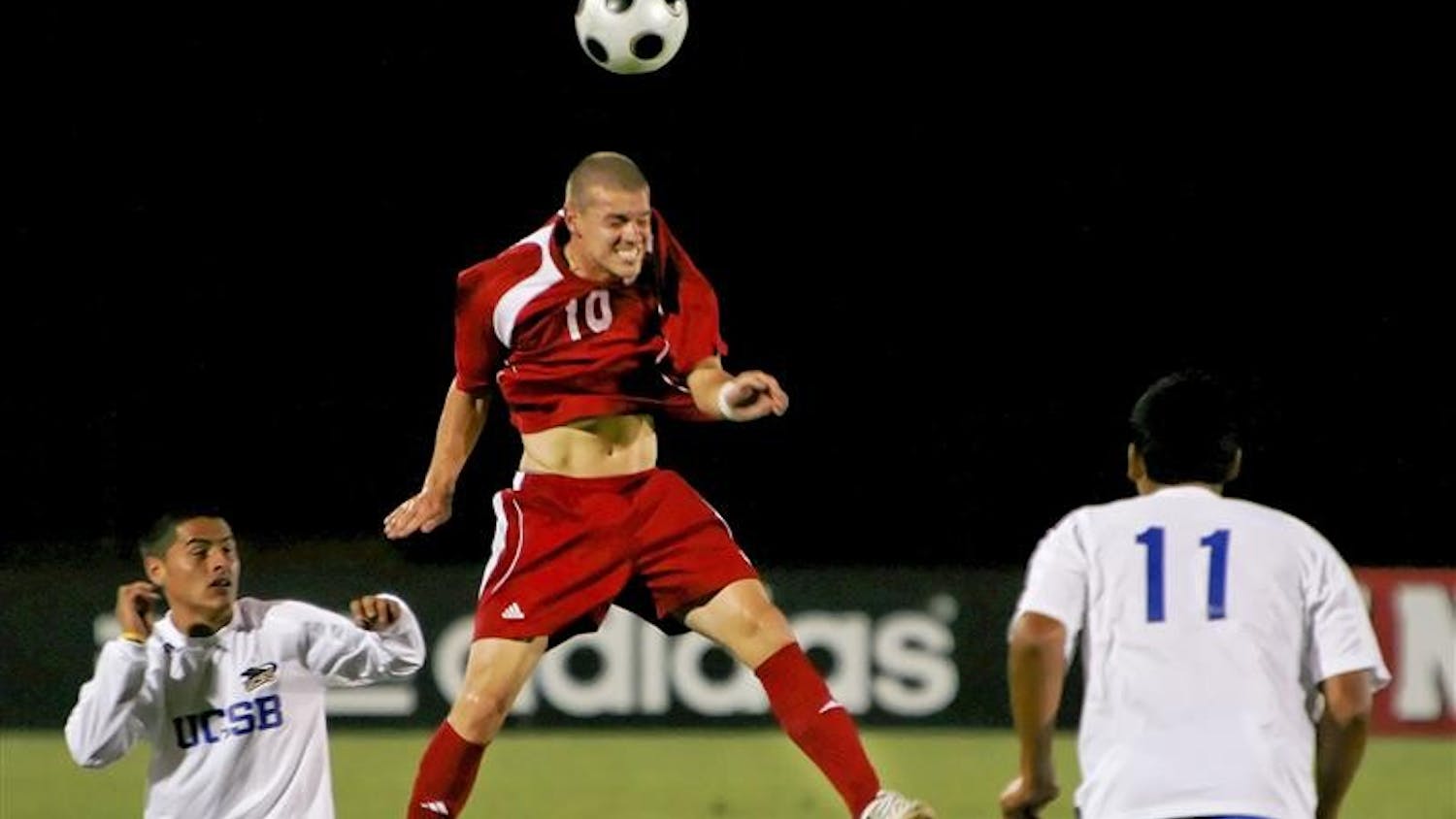 Sophomore midfielder Andy Adlard heads the ball during the Hoosiers' 2-1 loss to UC Santa Barbara on Friday, Sept. 26 at Bill Armstrong Stadium.