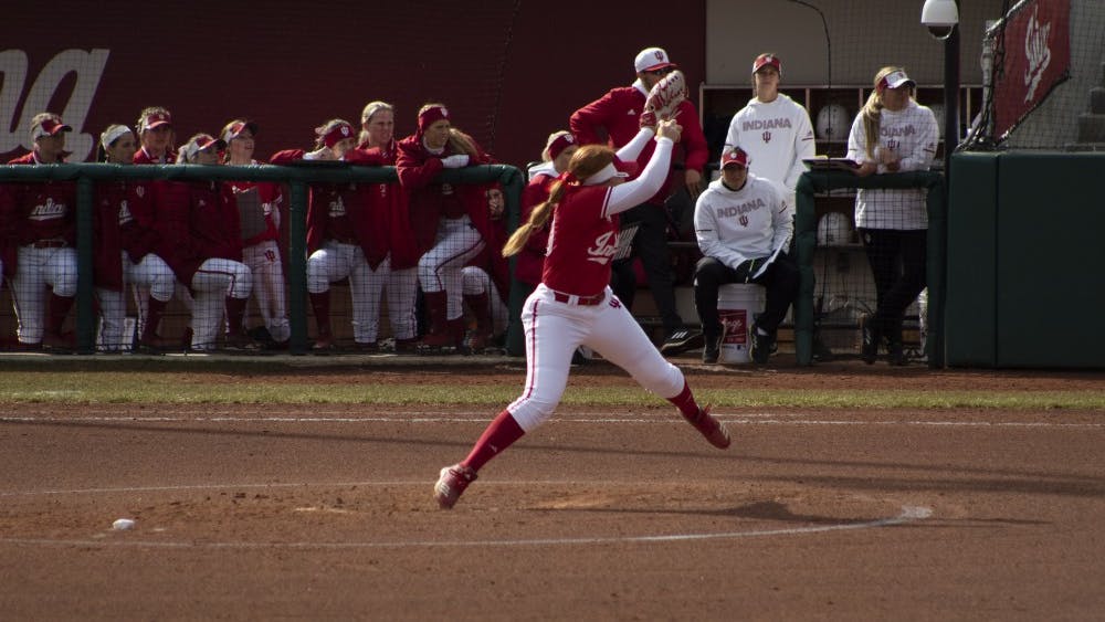 Junior pitcher Emily Goodin sends out a pitch March 17 against Saint Francis University. IU played Ohio State on Sunday and lost, 0-2.