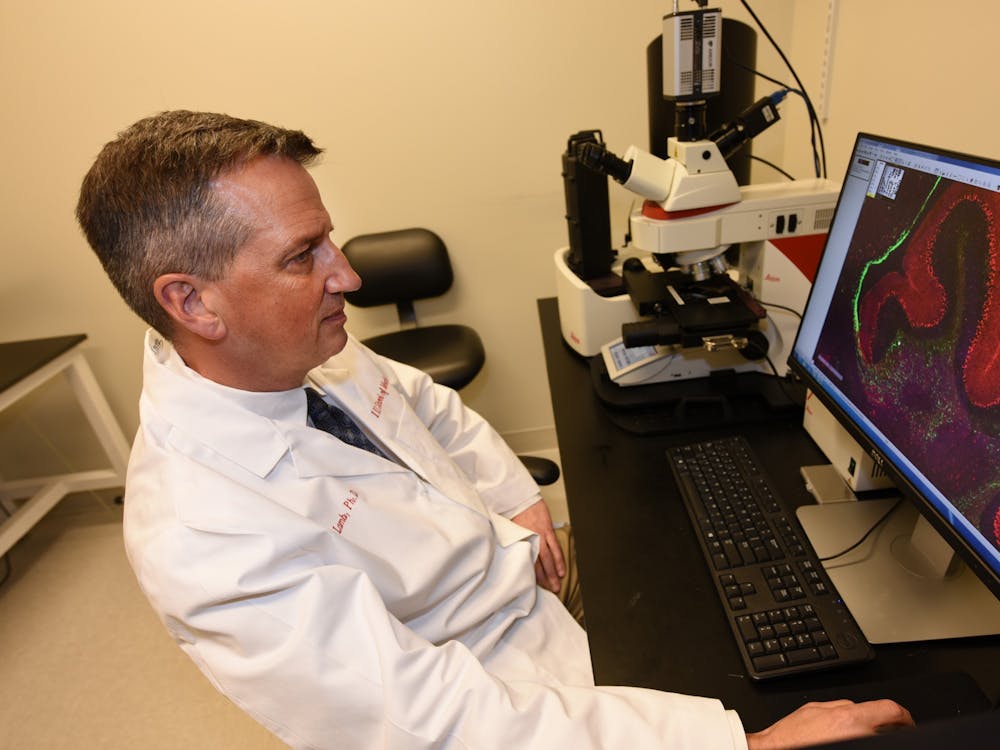 Stark Neurosciences Research Institute executive director Bruce Lamb conducts research on Alzheimer&#x27;s disease at an IU School of Medicine laboratory in Indianapolis. The institute received almost $8.7 million in grants to investigate possible causes of and treatments for the disease.
