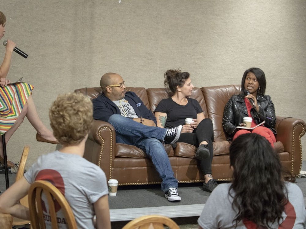 Panelist Alisha Lola Jones, right, an assistant professor in the Folklore and Ethnomusicology Department, talks about female-identifying artists in hip-hop. The panel met Thursday evening in the Indiana Memorial Union.