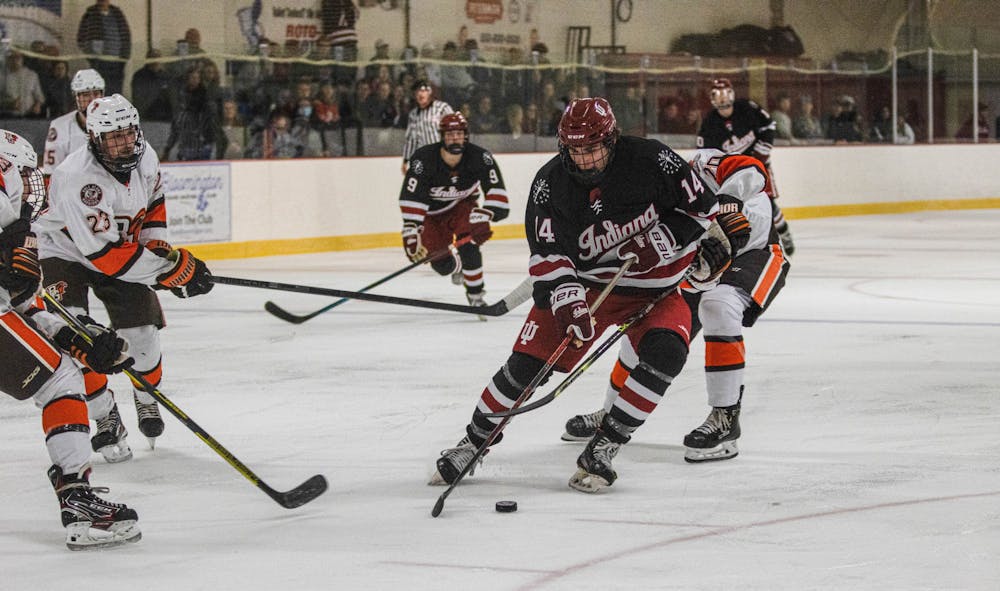 <p>Freshman forward Matt Spears controls the puck during a match against Bowling Green State University Oct. 15, 2022, at the Frank Southern Ice Arena.﻿ The Hoosiers lost both matches against the University of Louisville this past weekend.</p>
