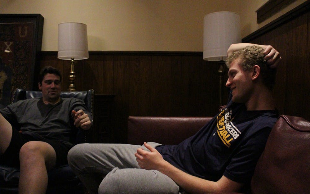 Left, Interfraternity Council Vice President of Standards, Jack Polte talks with IFC Vice President of Recruitment Adam Weber, right. The two members discuss the success of IFC's "No Shave November" initiative that raised $10,500 this past fall. 