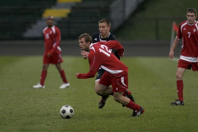 Junior Darren Yeagle avoids a defender during IU's 0-0 tie with the Cincinnati Bearcats on Wednesday evening at Bill Armstrong Stadium. The Hoosiers play their next game April 18 in Fort Wayne against Akron. 