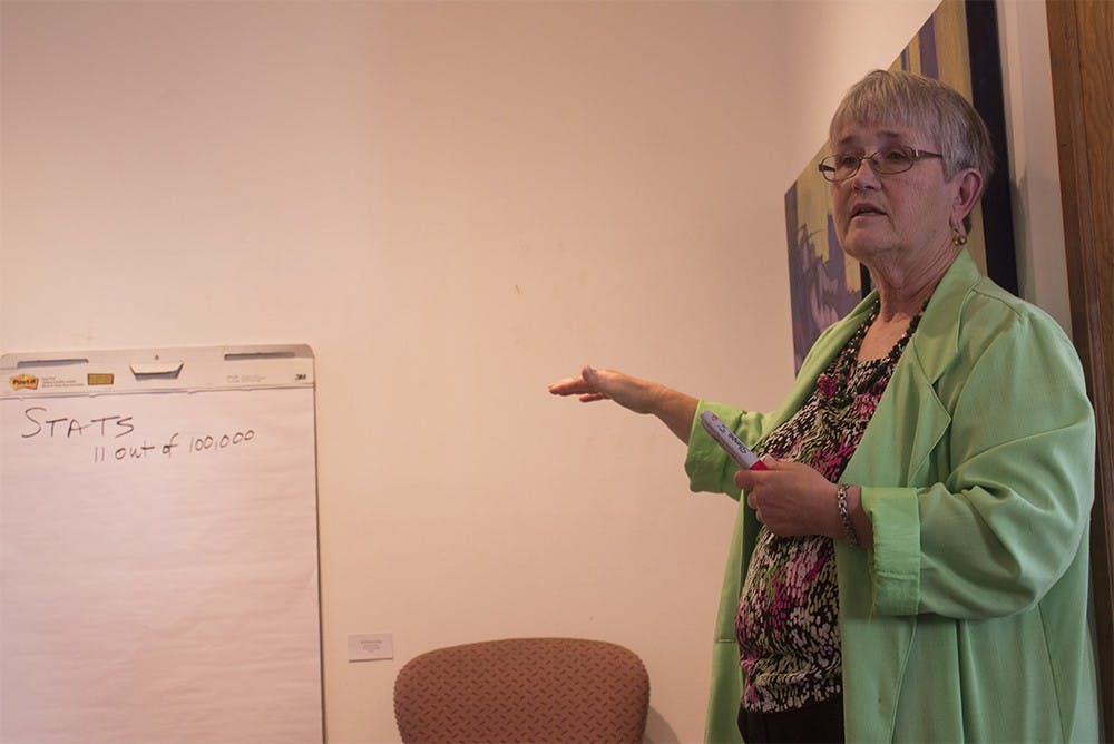 Cindy Houston, a certified trainer in Applied Suicide Intervention SkillsTraining, explains how about 11 of 100,000 people commits suicide in the United States at a talk on Tuesday night at the Venue. Houston went on to say that in Indiana the rate of suicide is slightly higher with 12 or 13 out of 100,000 committing suicide.
