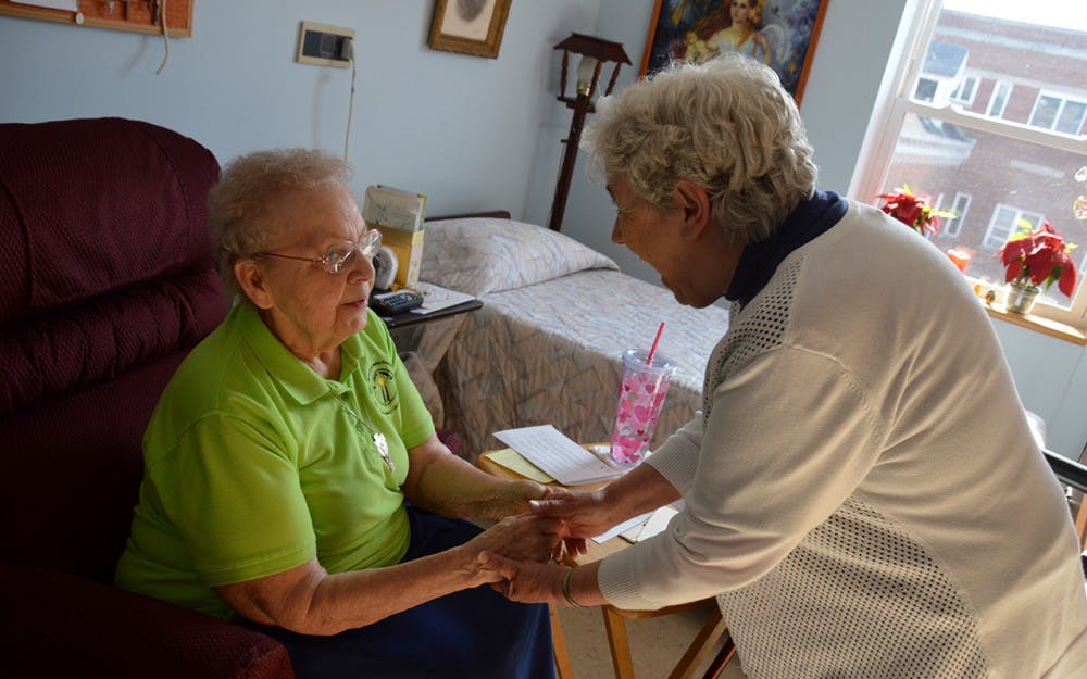 Sisters Irene Hoff and Alacoque Burger catch one another up on the day's happenings in Irene's room.&nbsp;Irene will celebrate her 70th Jubilee this April, which means&nbsp;she has been a sister of St. Francis for 70 years.