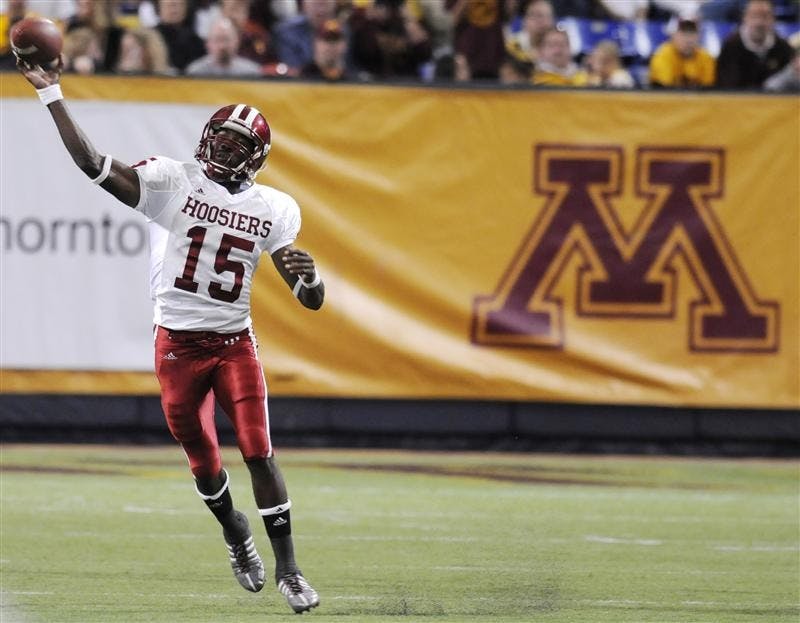 IU quarterback Kellen Lewis throws downfield during a game verses Minnesota on Saturday in Minneapolis. Lewis passed for 167 yards in IU's 16-7 loss.