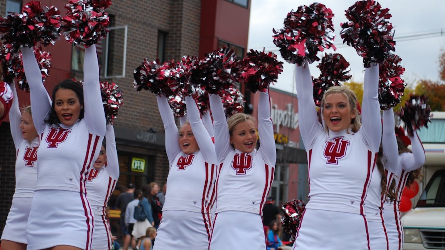 The IU Cheerleaders stop on Kirkwood to get the crowd spirit up. The parade concluded at Sample Gates with a pep rally.