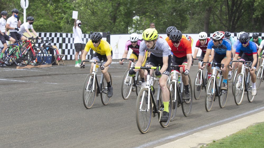 Riders race on the track during the Men&#x27;s Little 500 race May 27, 2021, at Bill Armstrong Stadium. The Indiana University Dance Marathon cycling team will make its debut at the men&#x27;s Little 500 on Saturday.
