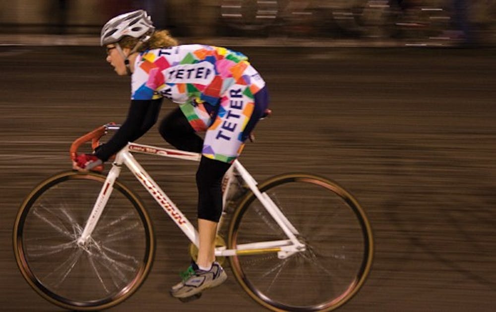 Teter rider Sarah Rieke races down the front stretch during Team Pursuit Saturday evening at Bill Armstrong Stadium. Teter defeated Kappa Delta in the Team Pursuit finals.