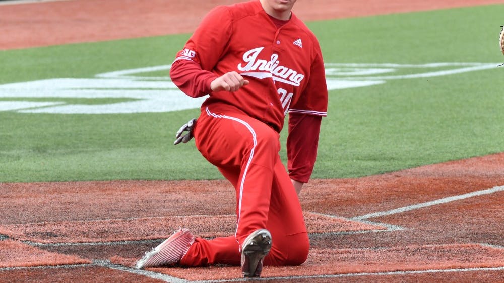 Then-sophomore infielder Scotty Bradley, now a junior, slides into home plate against Purdue on April 8, 2018, at Bart Kaufman Field. 