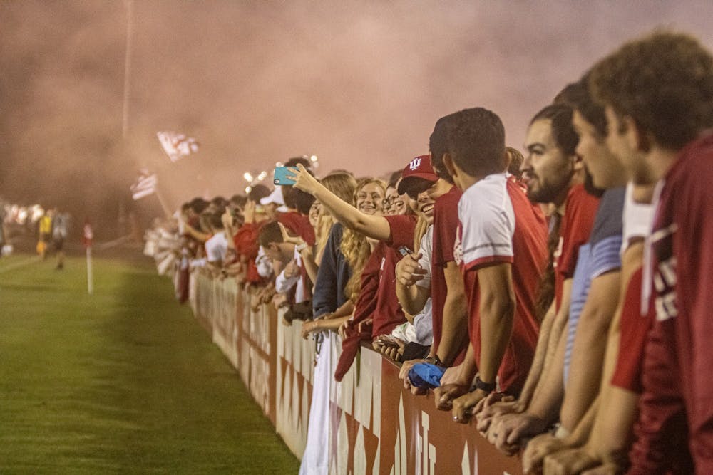 The Hoosier Army supporters’ section celebrates IU men’s soccer team’s lone goal in a victory against Butler  on Aug. 31, 2021, at Bill Armstrong Stadium. The Hoosiers won 1-0 in their home opener against Butler.