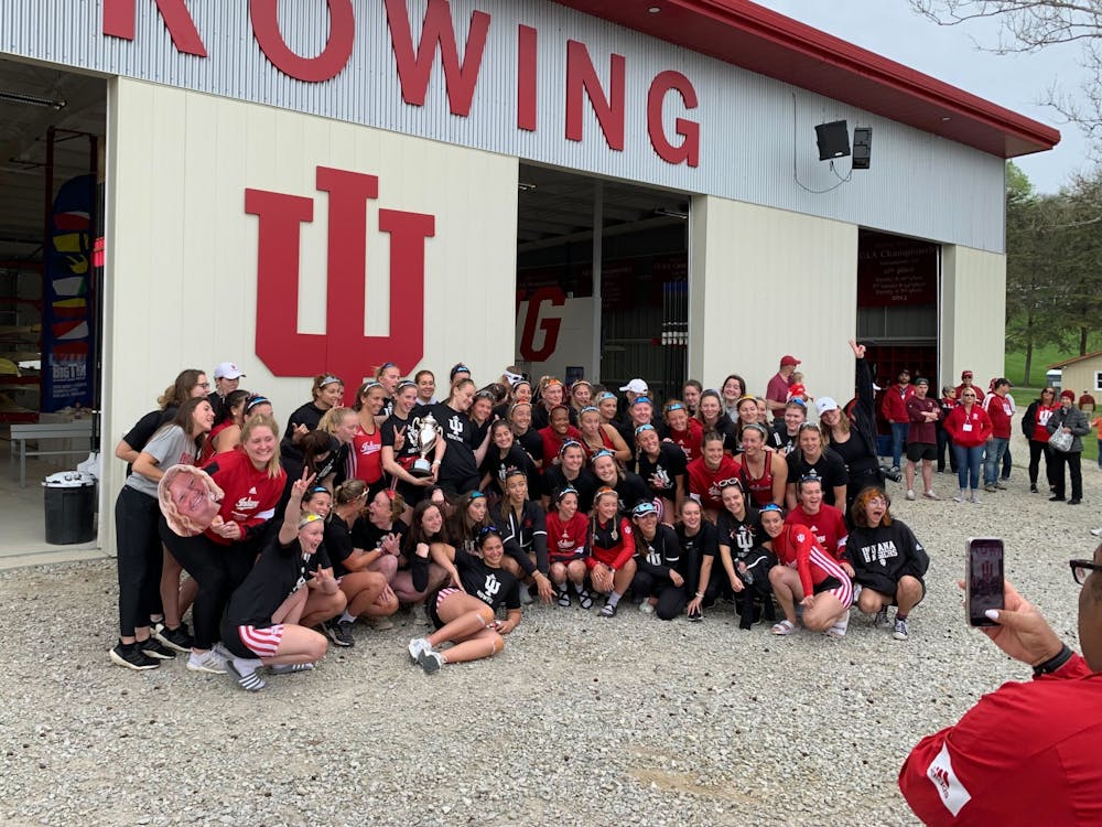Members of the Indiana rowing team celebrate April 30, 2022, at Lake Lemon. The Hoosiers ended the season with a fourth place finish in the conference.