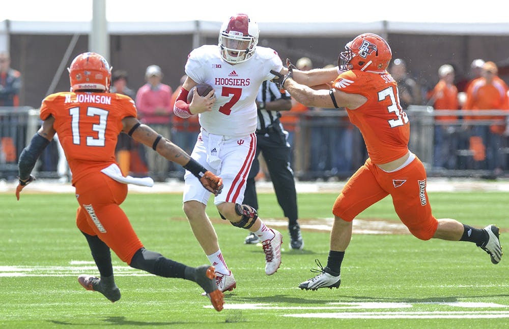 Junior quarterback Nate Sudfeld runs with the ball during IU's game against Bowling Green on Saturday at Doyt Perry Stadium.