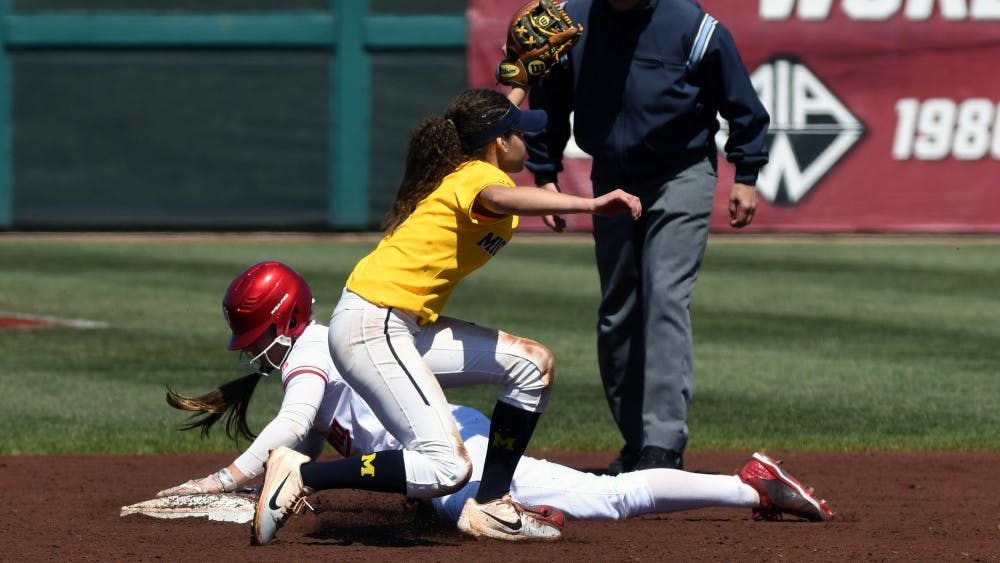 Michigan tags an IU runner out at second base. IU lost to Michigan, 2-0, Sunday afternoon at Andy Mohr Field.