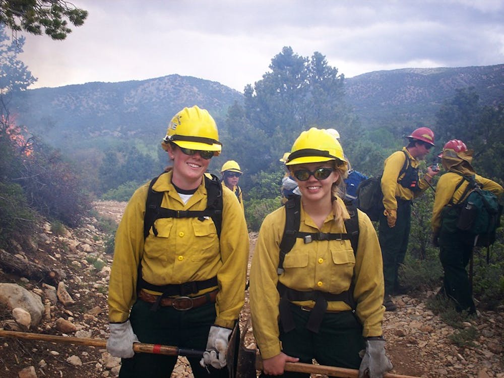 Courtesy photo - IU junior Sarah Markley, right, works for the Manti-La Sal National Forest digging fire lines to stop the spread of forest fires.