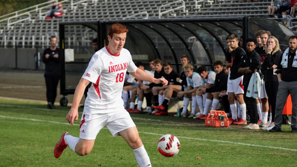 Then-junior forward Ryan Wittenbrink goes to kick the ball against Northwestern on Nov. 10, 2021, at Bill Armstrong Stadium. Despite losing the match, IU was able to match Clemson University&#x27;s energetic playing style.