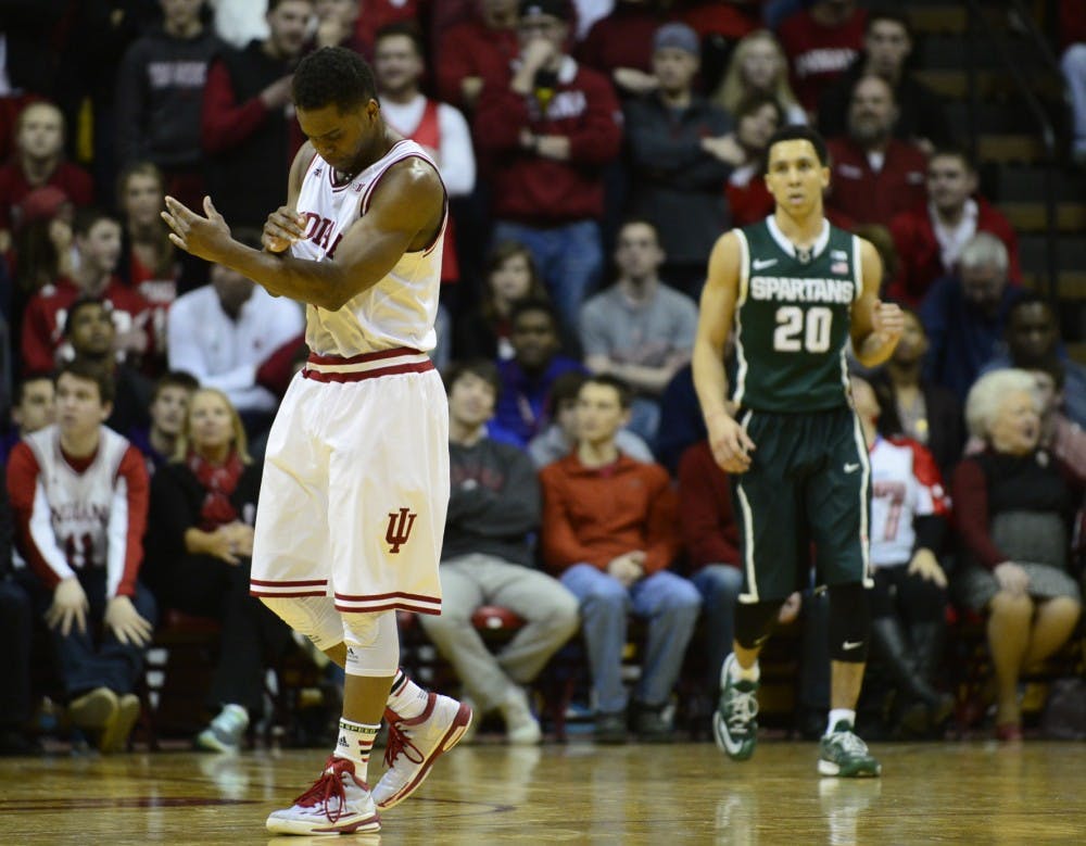 Junior guard Kevin "Yogi" Ferrell reacts after missing a three-pointer during the final minute of IU's game against Michigan State on Saturday at Assembly Hall. Ferrell scored 21 points in the 74-72 loss to the Spartans.