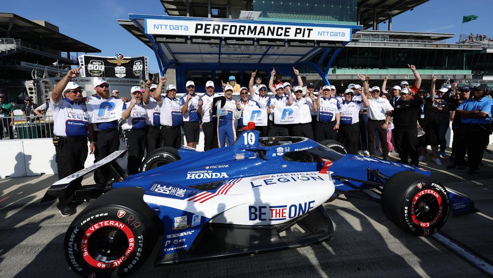 Chip Ganassi Racing&#x27;s Alex Palou celebrates achieving the NTT P1 Award at Indianapolis Motor Speedway Sunday, May 21.Palou finished in the fourth position in his fourth Indianapolis 500.  