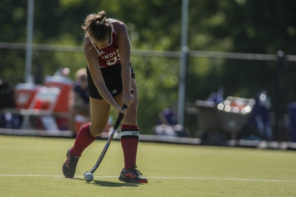 <p>Graduate back Elle Hempt takes a shot during a match against Northwestern on Sept. 14 at the IU Field Hockey Complex. IU is 4-11 on the season.</p>