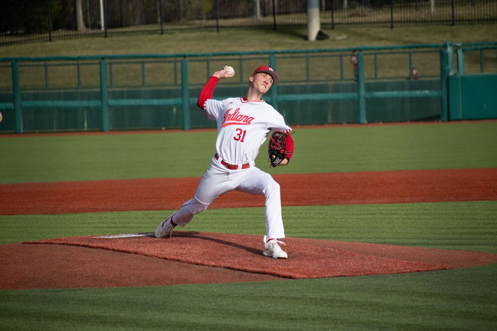 <p>Freshman right-handed pitcher Evan Whiteaker throws a pitch February 22, 2023 against Miami (Ohio) at Bart Kaufman Field in Bloomington, Indiana. Whiteaker threw just over four innings, not allowing an earned run, in Indiana&#x27;s 4-3 victory over Illinois in the Big Ten Tournament May 23. </p>