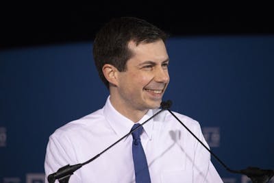 Then-South Bend Mayor Pete Buttigieg smiles April 14, 2019, as he speaks about running for president in 2020 in Studebaker Building 84 in South Bend, Indiana.