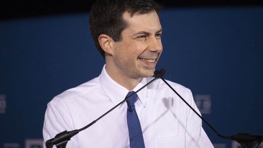 Then-South Bend Mayor Pete Buttigieg smiles April 14, 2019, as he speaks about running for president in 2020 in Studebaker Building 84 in South Bend, Indiana.