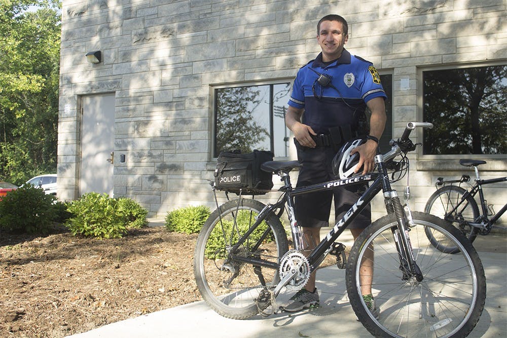 IU senior Michael Smolen is one of IUPD's part-time student officers that does bike patrols. Officers that go through the bike patrol program have to complete a rigorous three-day training that includes bike safety and 15 mile rides.