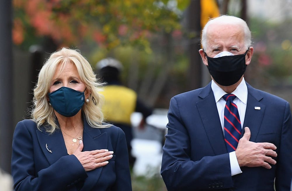 <p>President-elect Joe Biden and his wife Jill Biden pay their respects during a Veterans Day stop at the Korean War Memorial Park in Philadelphia on Wednesday, Nov. 11, 2020.</p><p><br/></p>