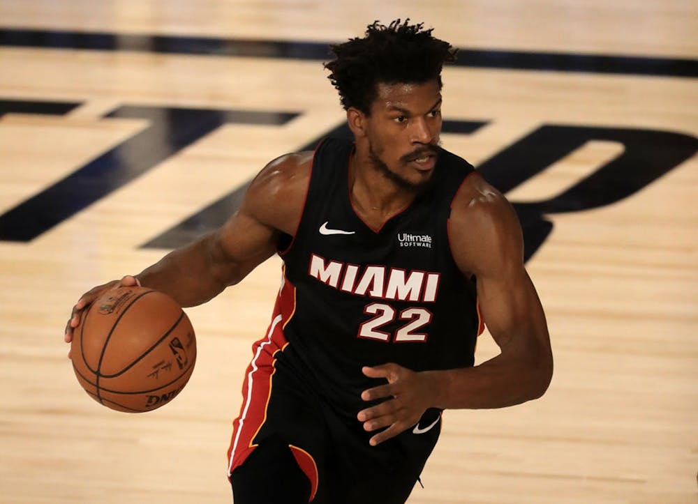 Jimmy Butler of the Miami Heat dribbles with the ball against the