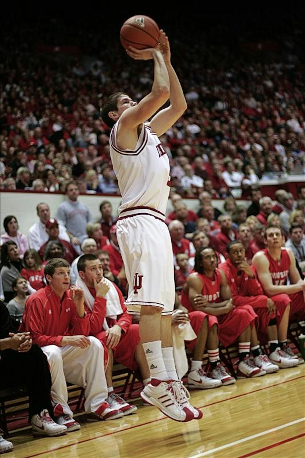 Freshman guard Matt Roth launches a 3-point shot from the corner during the Hoosiers 93-81 loss to Ohio State Saturday afternoon at Assembly Hall. Roth scored a career high 29 points shooting 9 of 11 from beyond the arc tying the IU single-game record.